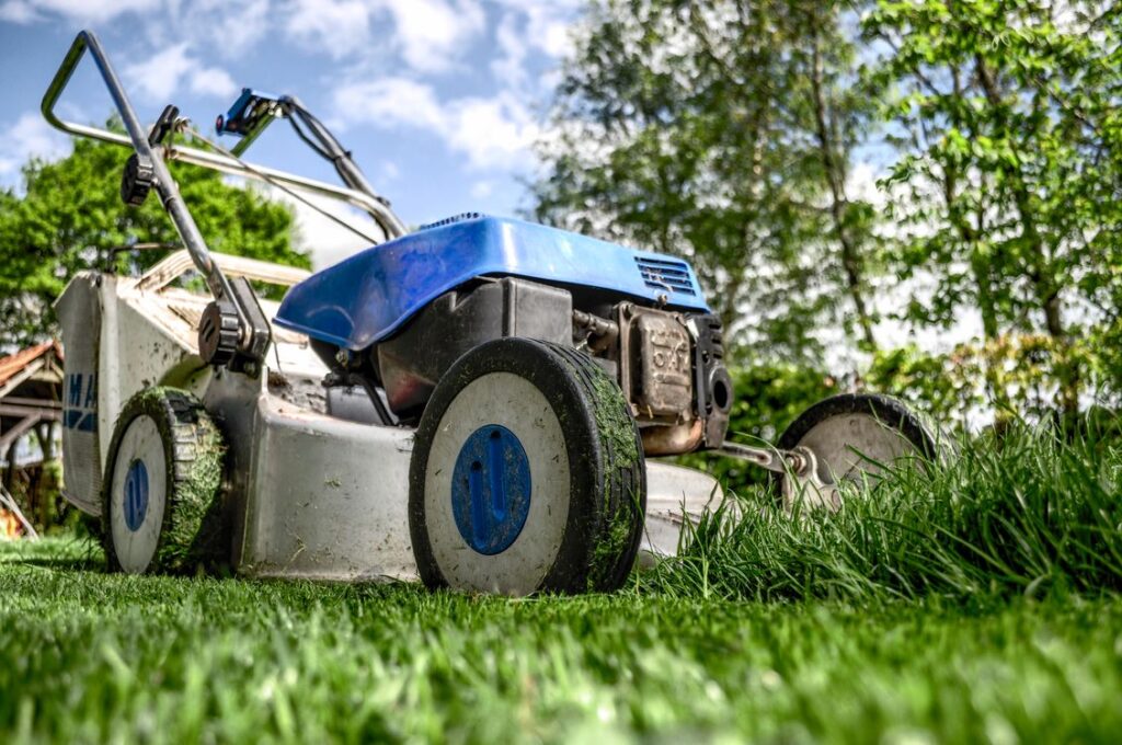 Landscaping business crew working on a residential lawn — photo via Pexels (CC0)